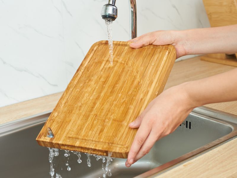 Hand washing bamboo cutting board